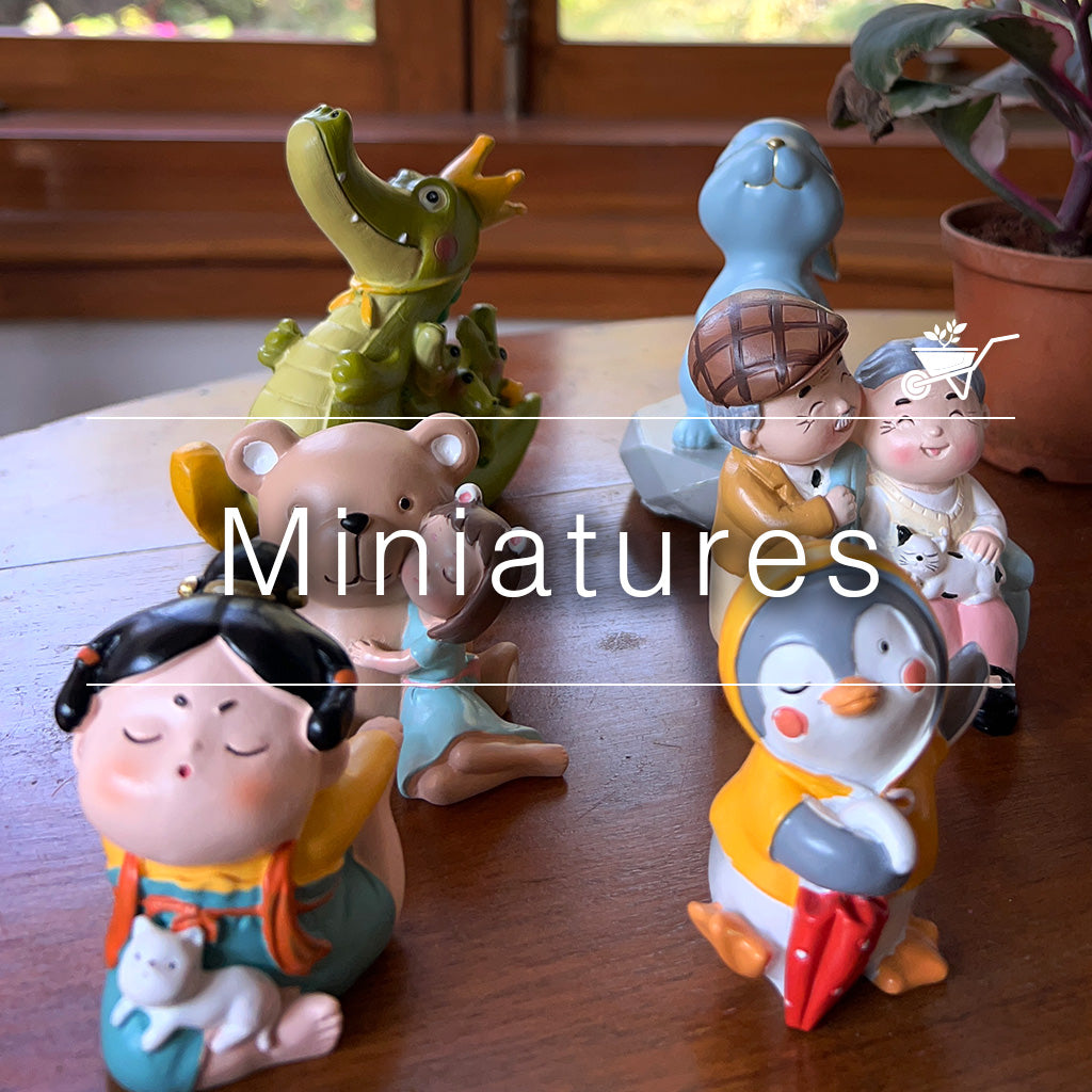 Colorful resin miniature figurines including penguin, doll, bear and crocodile for terrarium and tray garden déco by myBageecha