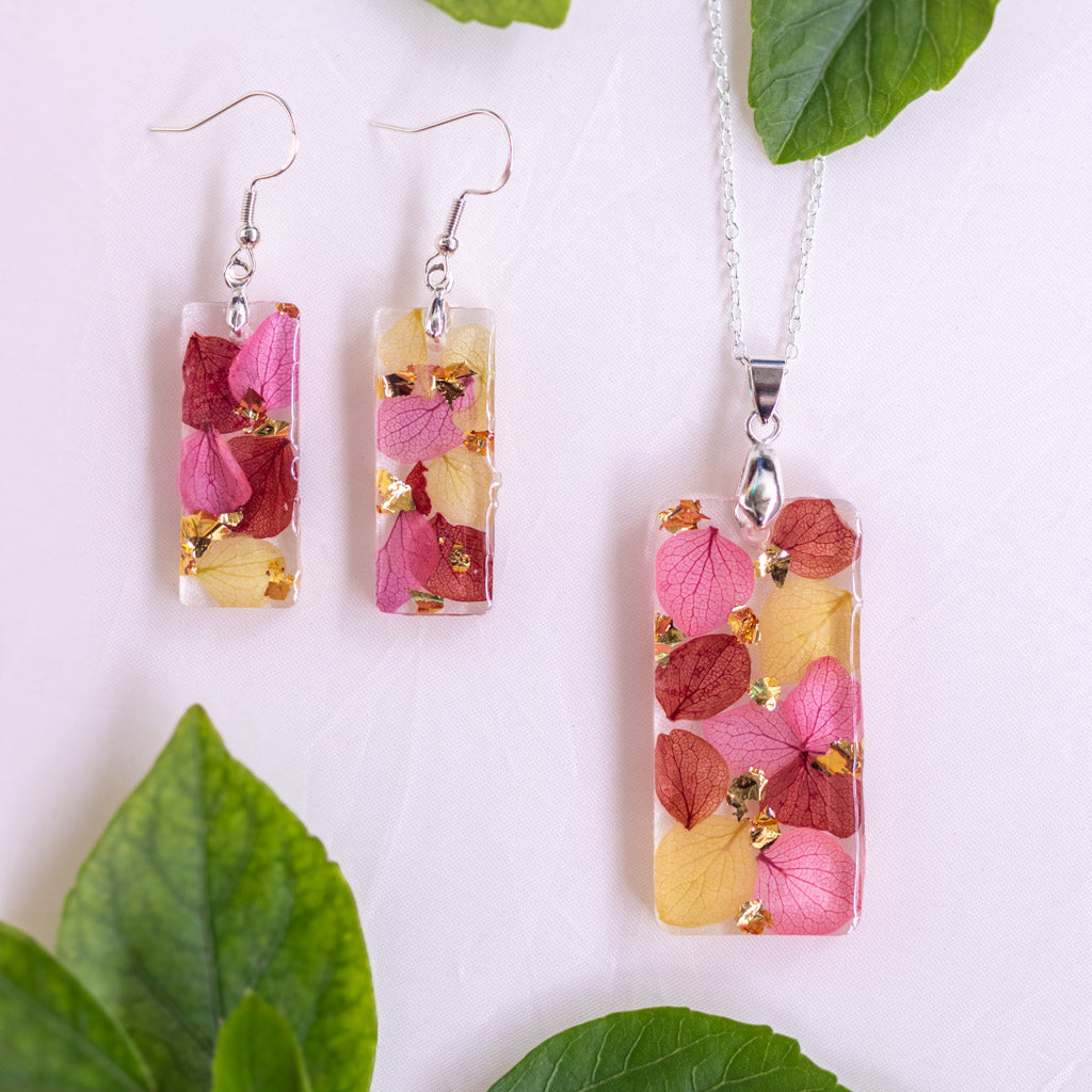 Close up of Hydrangea Happiness necklace and earrings set by myBageecha