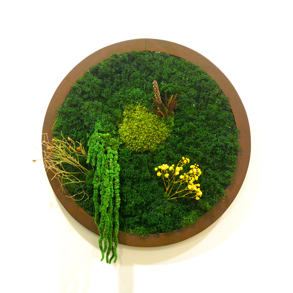 Forest-inspired preserved greenery wall art