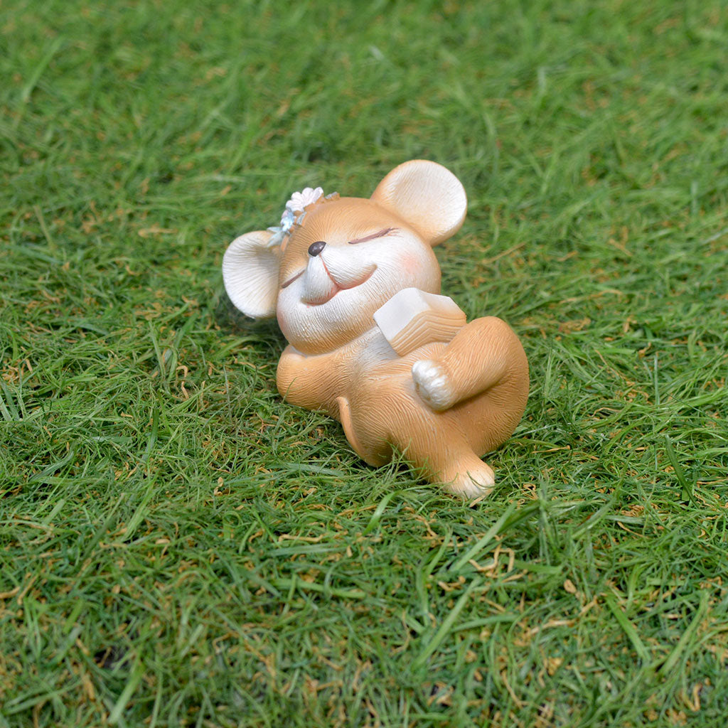 Resin deer reading book