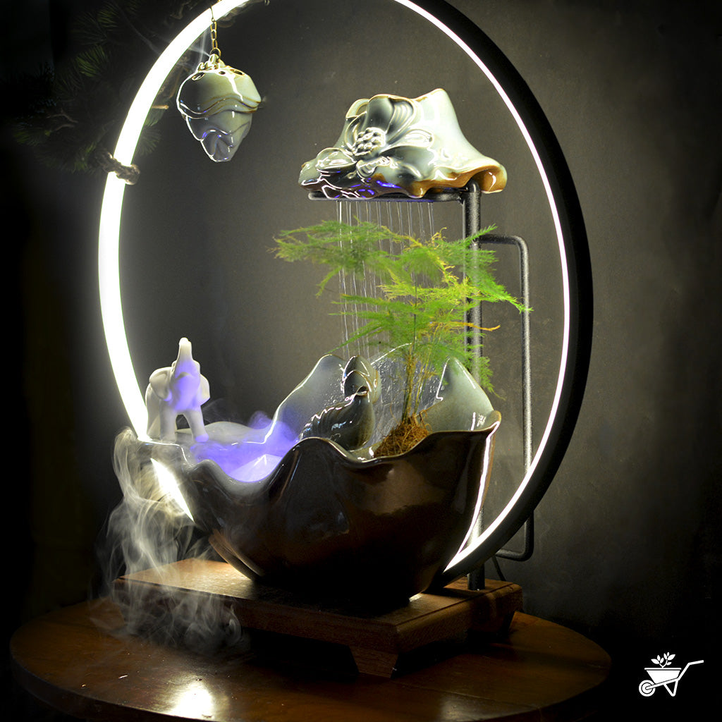 Elephant’s Oasis Water Fountain LED Decor Zen Garden – side angle showing LED glow and cascade