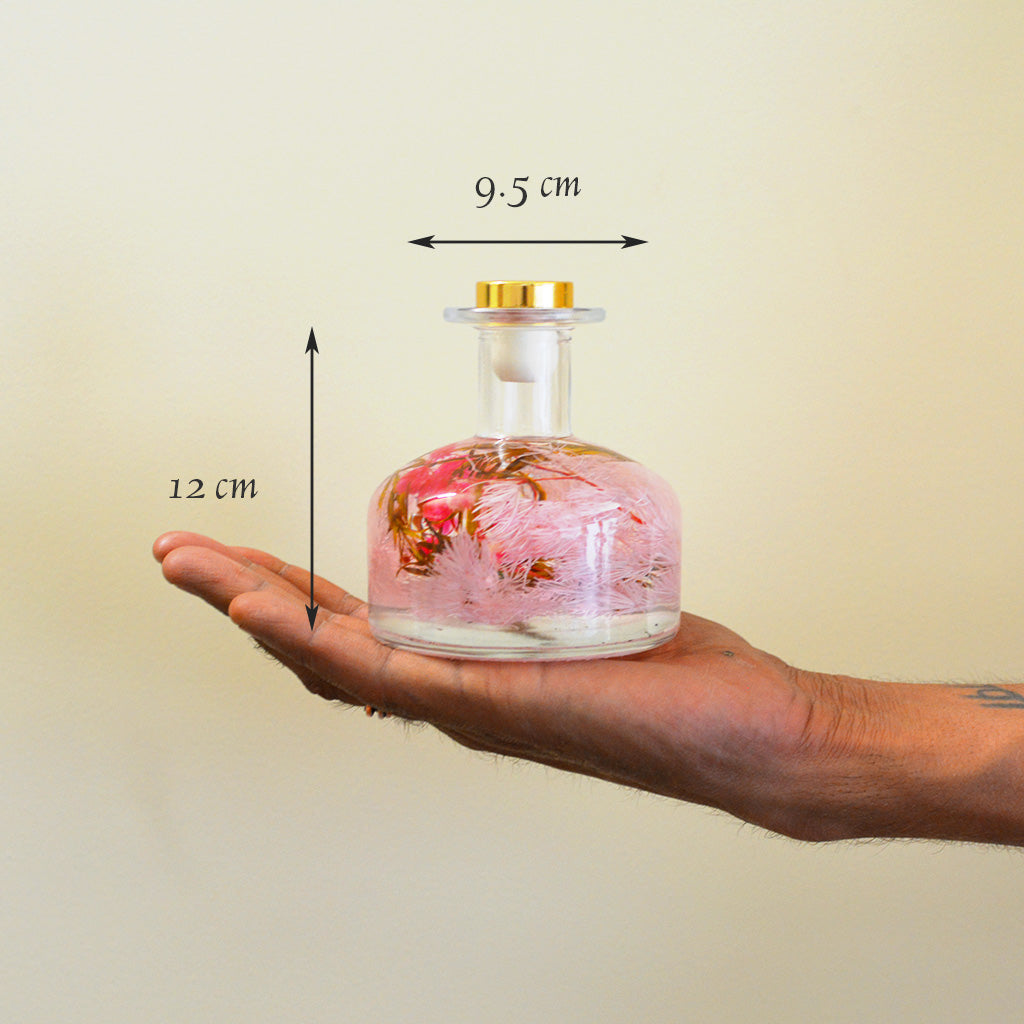 Evening Primrose Preserved Flower Tabletop shown in hand – petite cheerful preserved décor.