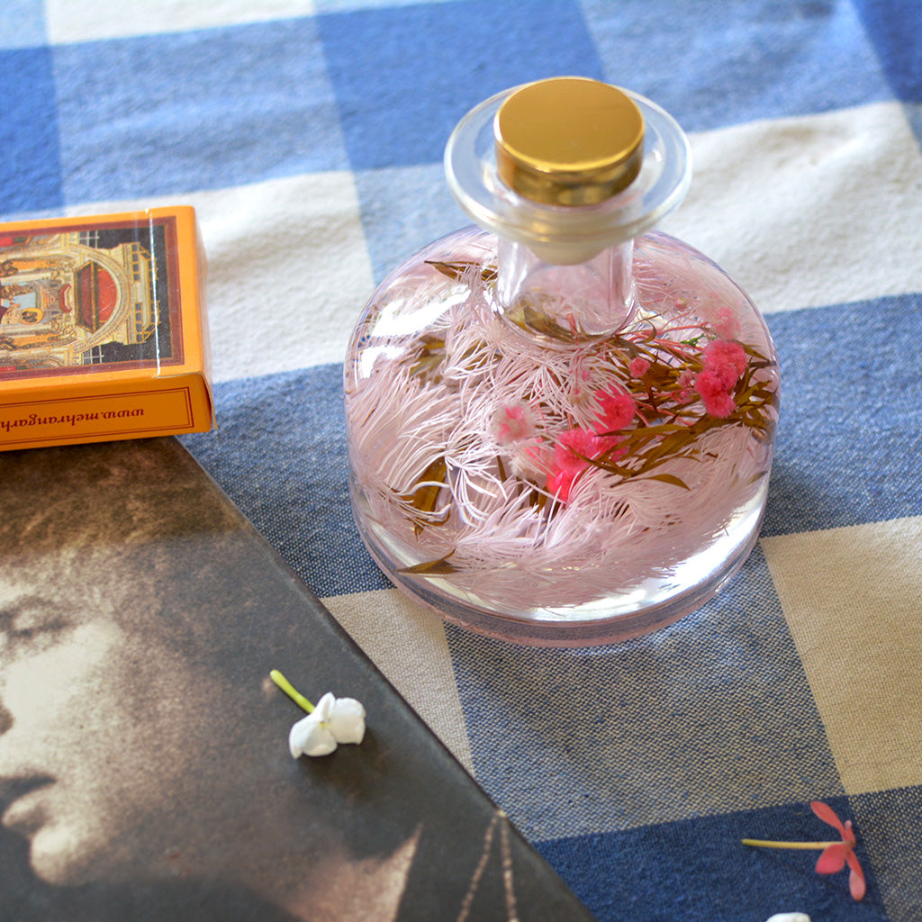 Evening Primrose Preserved Flower Tabletop placed on table – gentle warm floral accent.