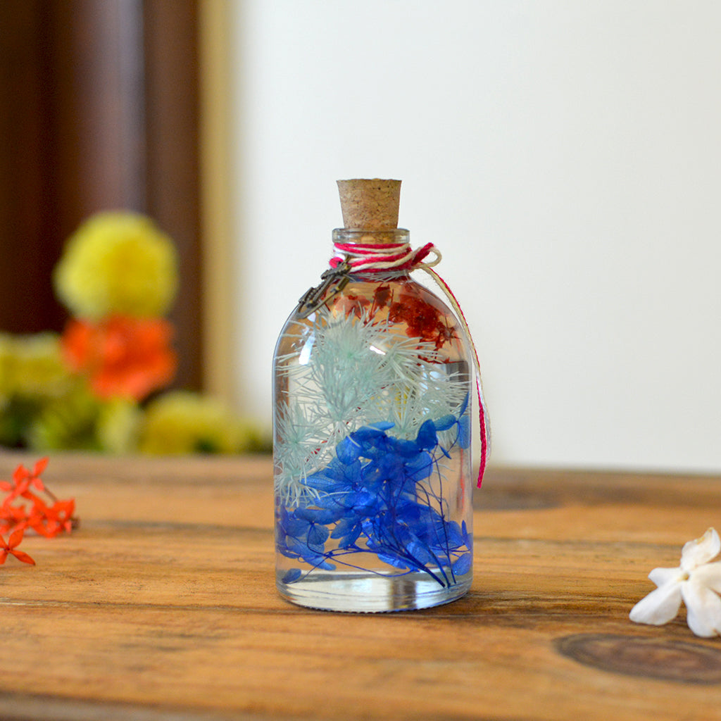 Deep indigo petals create a bold, confident preserved floral presence.
