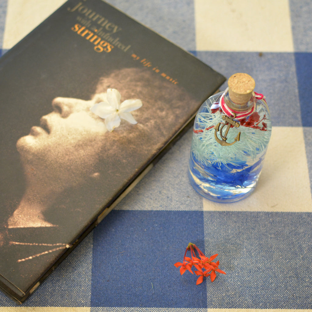 Indigo Florescence Preserved Flower Tabletop placed on table – strong color statement décor.