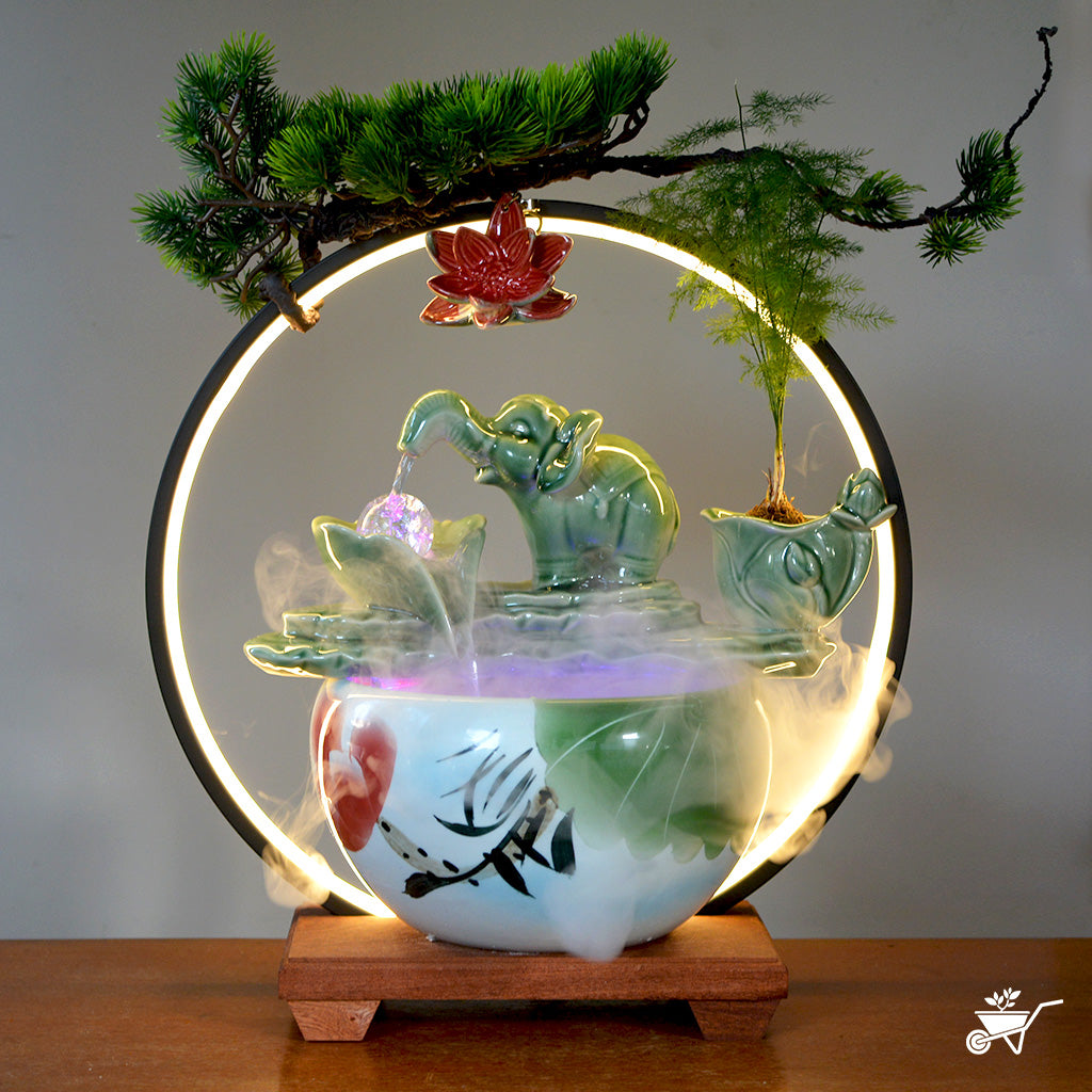 Jade Green Baby Elephant Water Fountain LED Decor Zen Garden – front view of elephant and flowing water