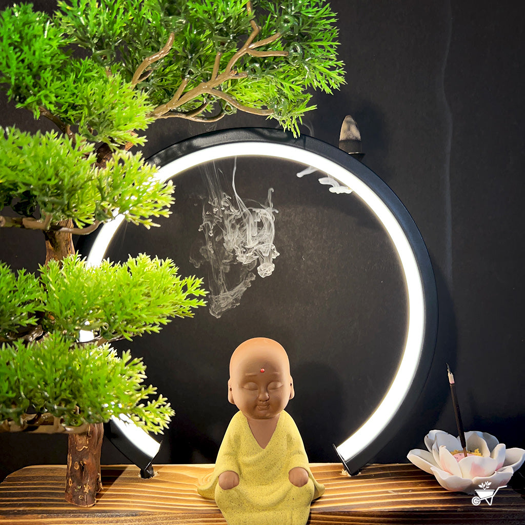 Little Monk in Bliss LED Decor Incense Burner Zen Garden – front view of smiling monk and incense trail