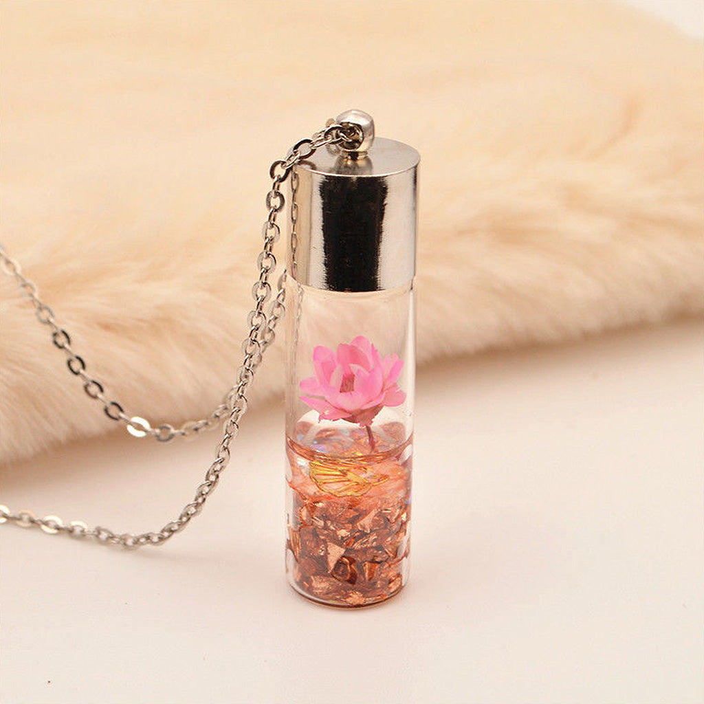 Lyrical Lotus necklace with pink real dried flower preserved in clear resin pendant