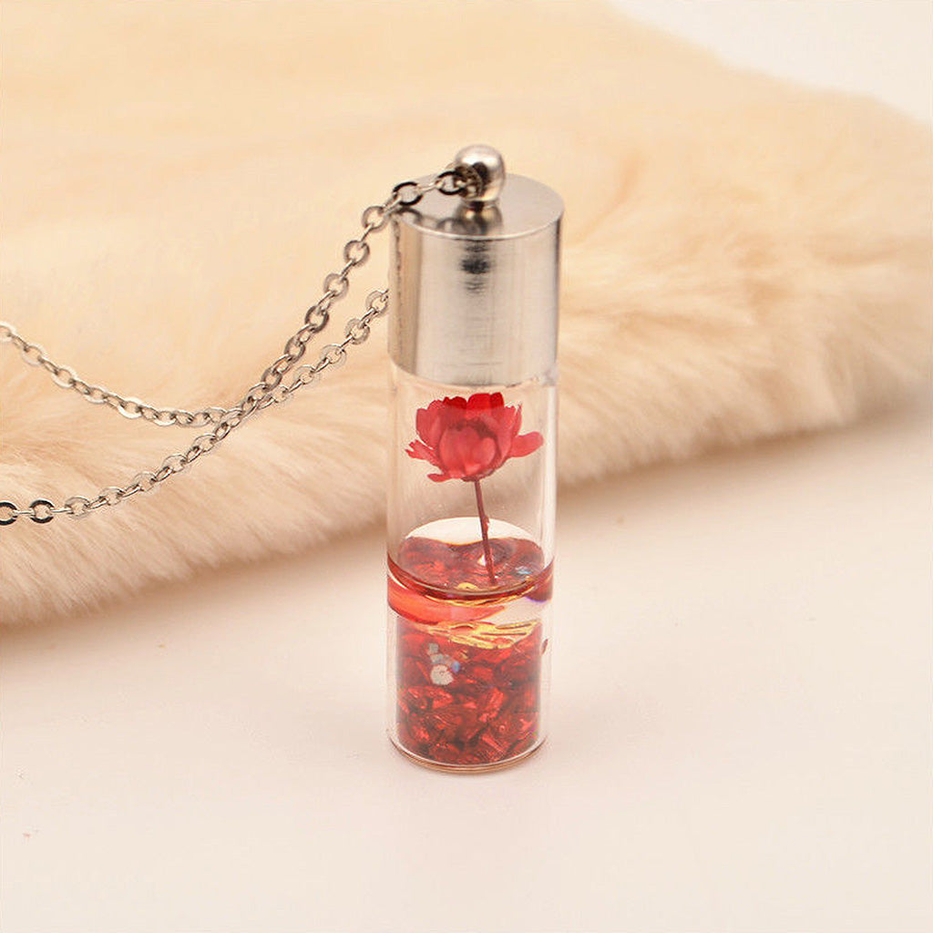 Red Lyrical Lotus real flower pendant necklace featuring vivid preserved bloom in resin