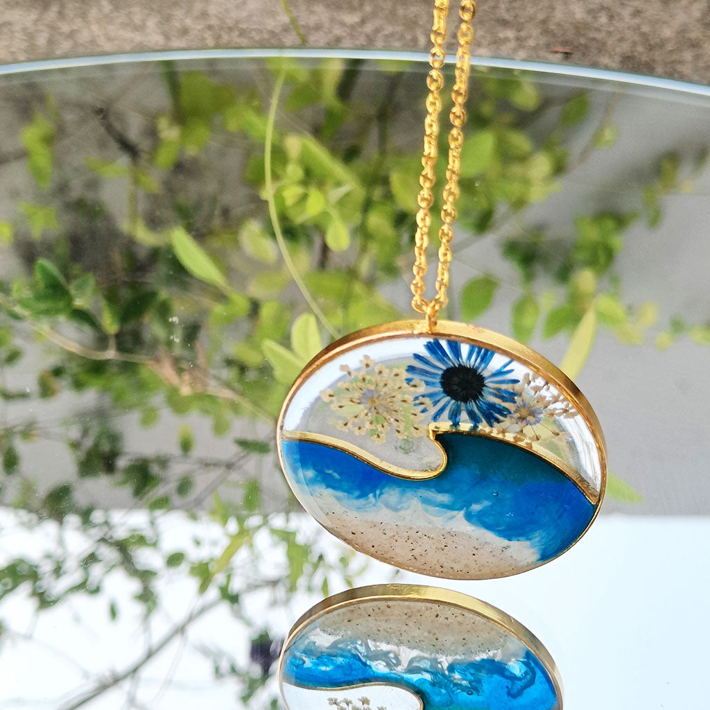 Blue wave resin pendant necklace with real dried flowers – Ocean Crest by myBageecha