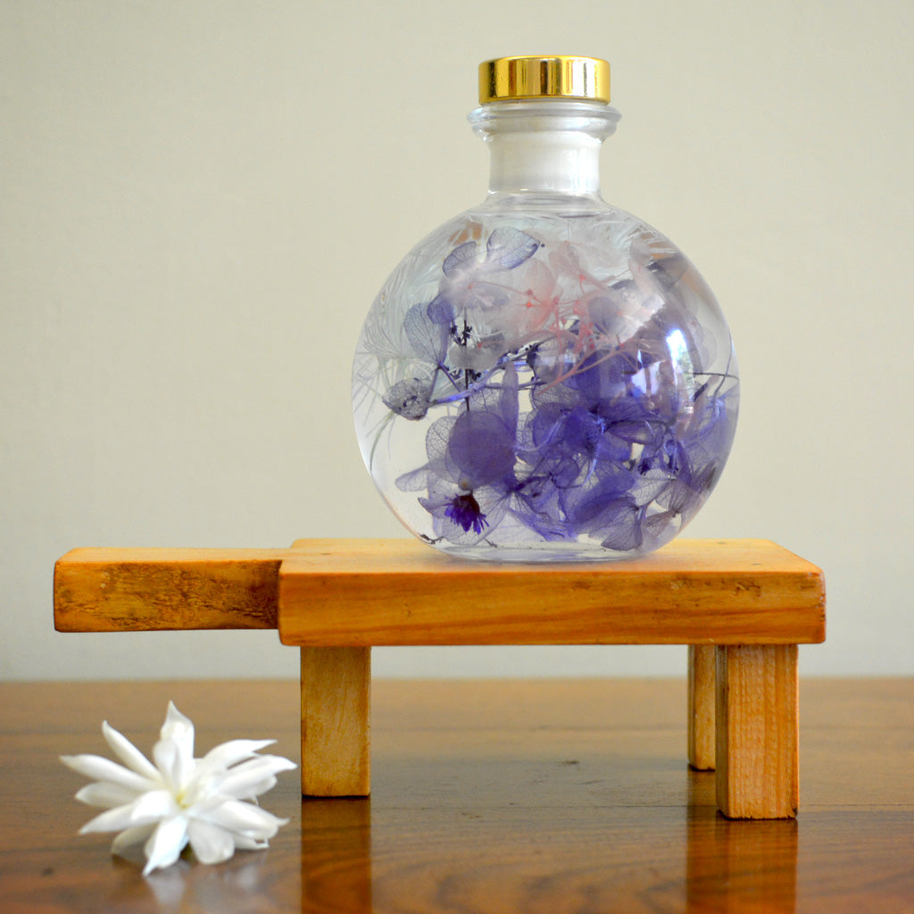 Pastel Blends Preserved Flower Tabletop on rectangular stand – soft and serene décor tone.