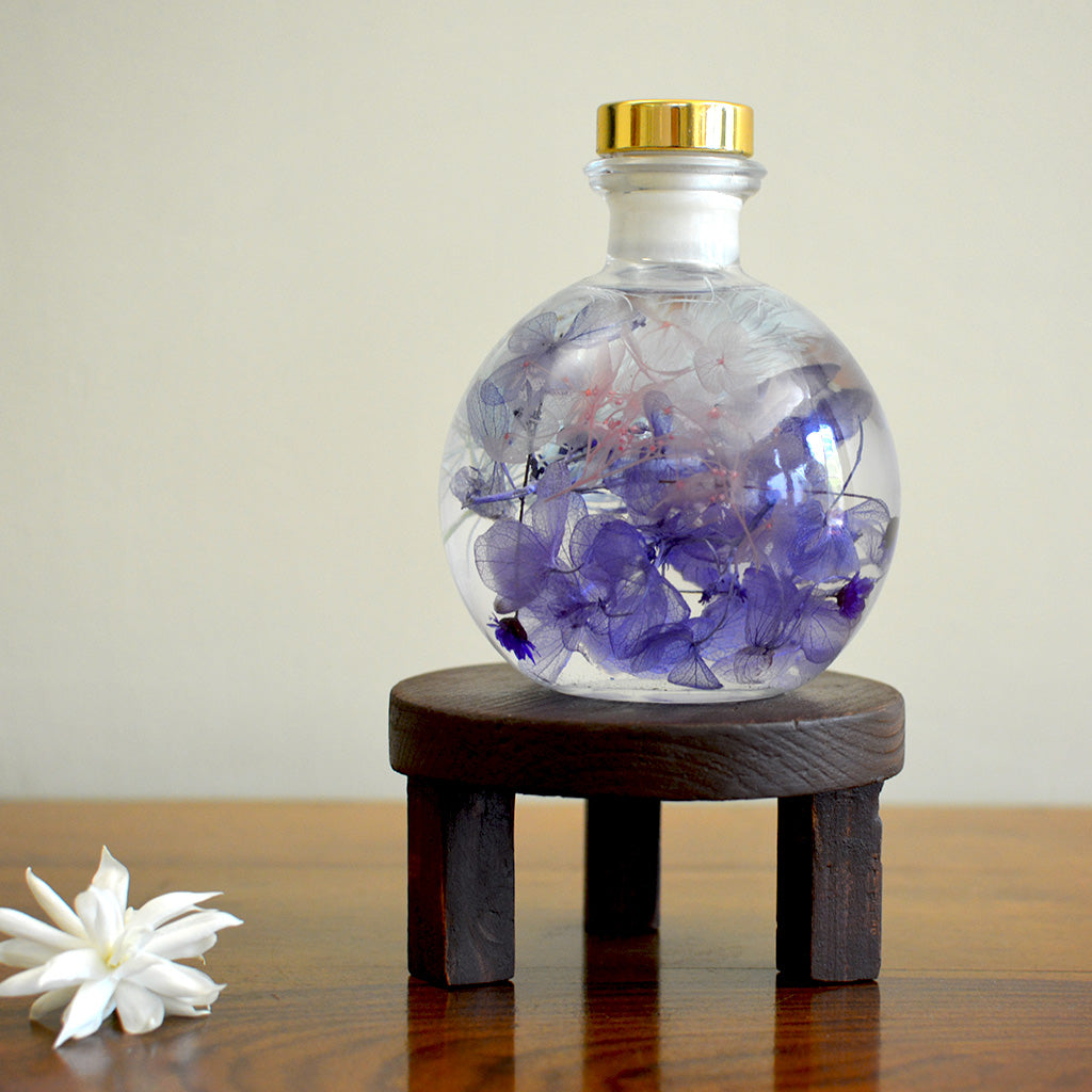 Pastel Blends Preserved Flower Tabletop on circular stand – light, airy preserved décor.