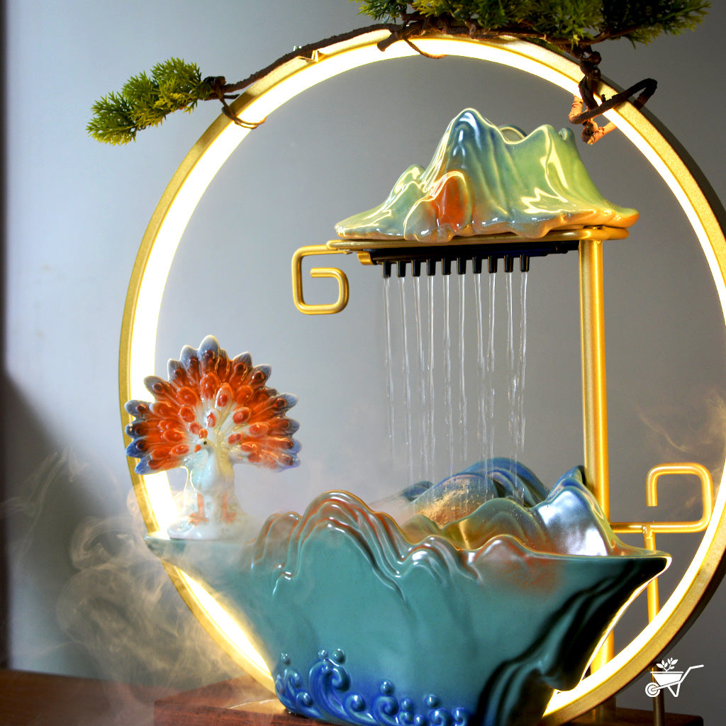 Peacock’s Rain Dance Water Fountain LED Decor Zen Garden – side angle highlighting LED glow and feathers