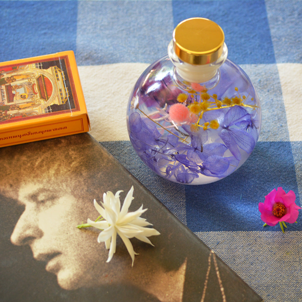 Plum Streak Preserved Flower Tabletop on table – chic and modern plum floral accent.