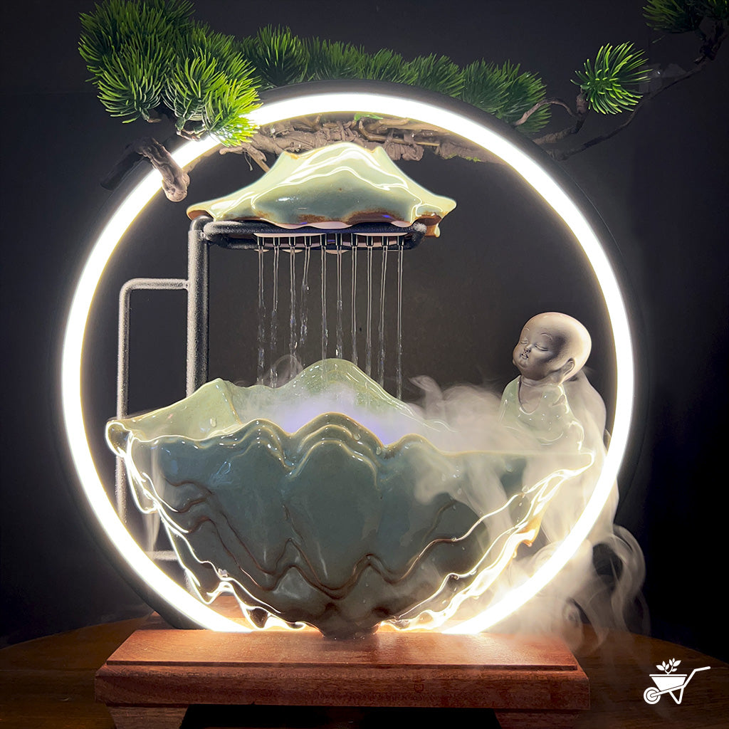 Sitting Monk Water Fountain LED Decor Zen Garden – front view of monk and flowing water