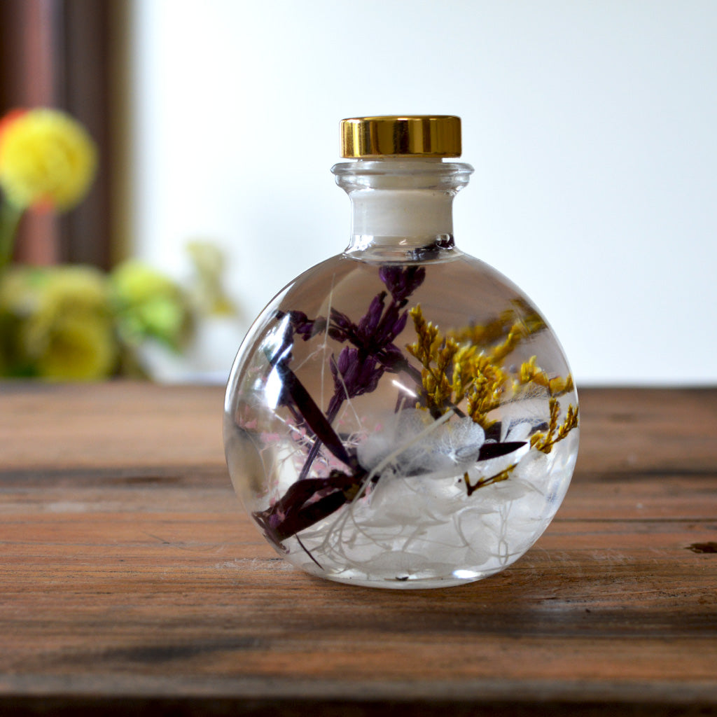 Close-up of Snowdrop Lavender Preserved Flower Tabletop by myBageecha – white and lavender preserved blooms in dome bottle décor.