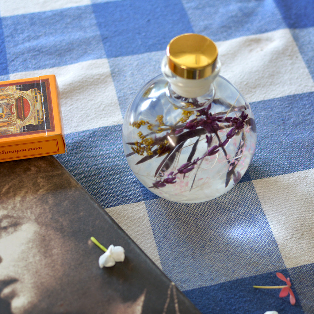 Snowdrop Lavender Preserved Flower Tabletop placed on table – minimalist & modern preserved décor accent.