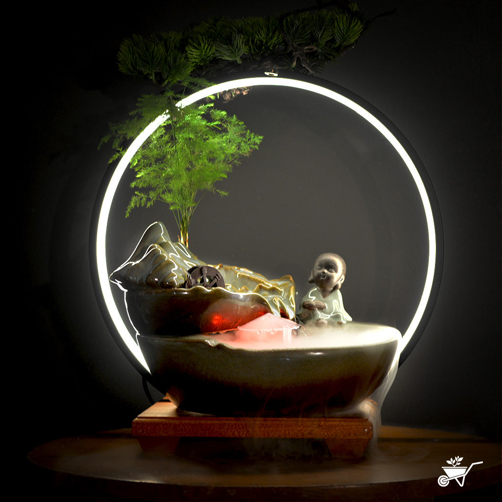 Thoughtful Monk Water Fountain LED Decor Zen Garden – meditating monk beside LED waterfall – LED tabletop Zen fountain decor for calming ambience by myBageecha