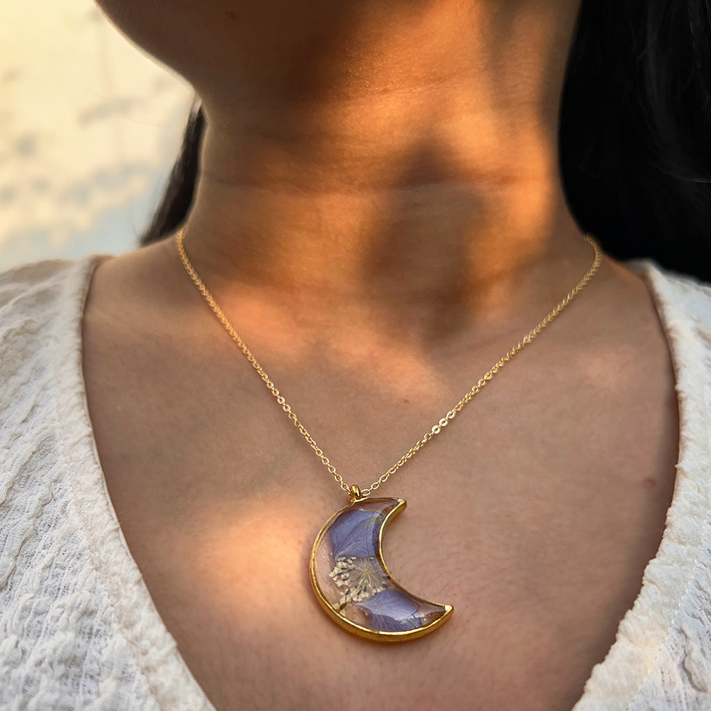 Woman wearing Wish Me a Moon necklace by myBageecha