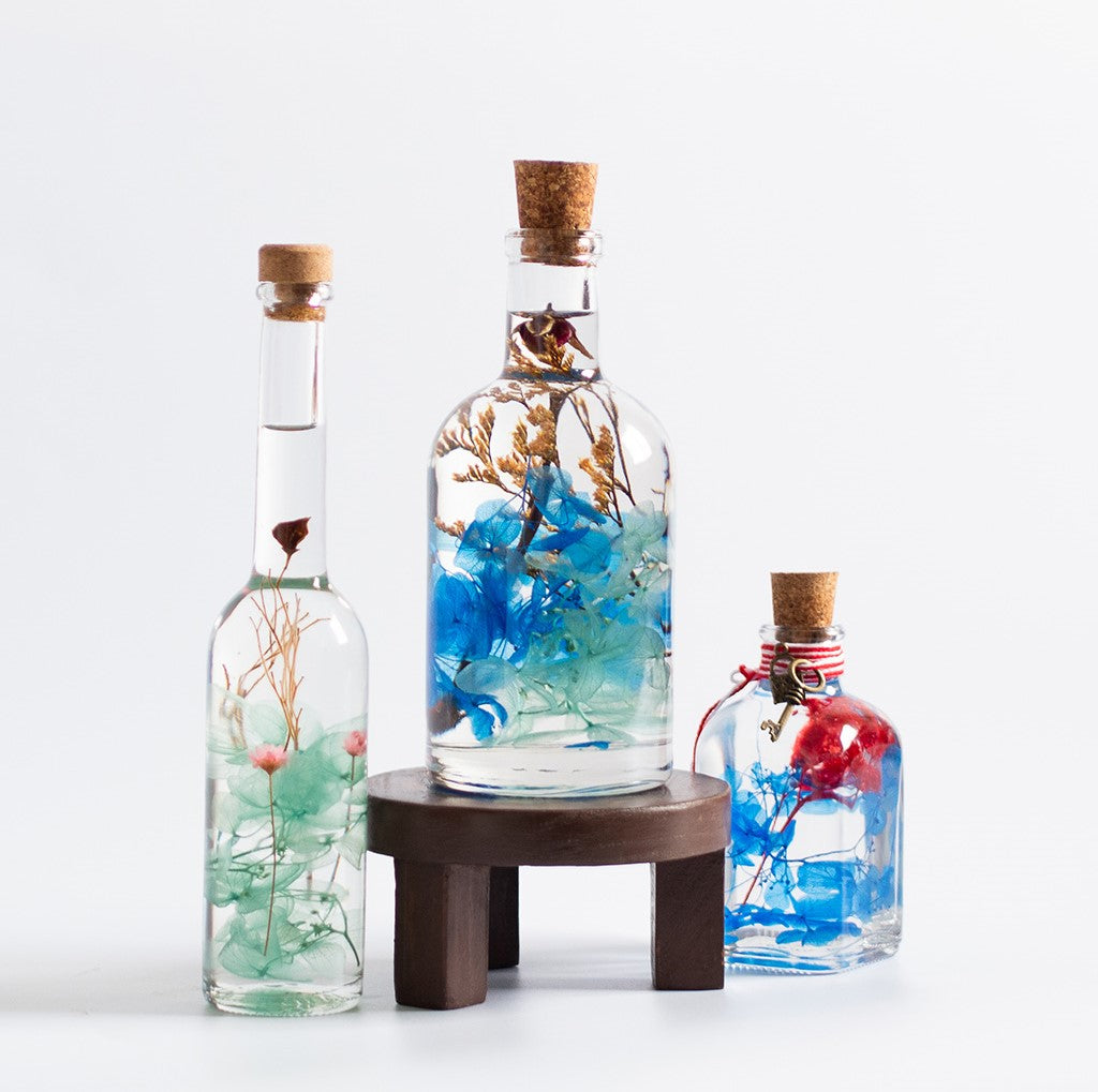 A vibrant curated set featuring lively and uplifting preserved flower tones inspired by bright skies.