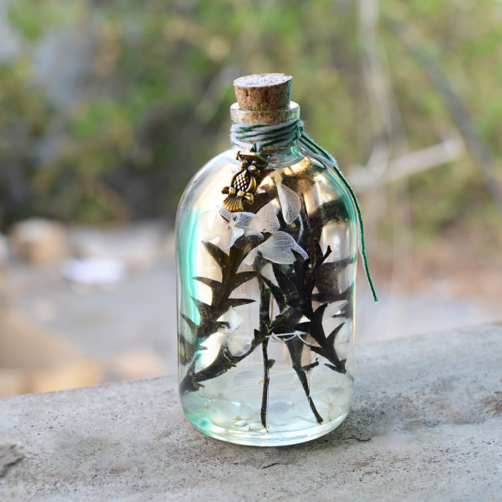 Close-up of Sacramento Hooter Preserved Flower Tabletop by myBageecha – preserved blooms with owl figurine.