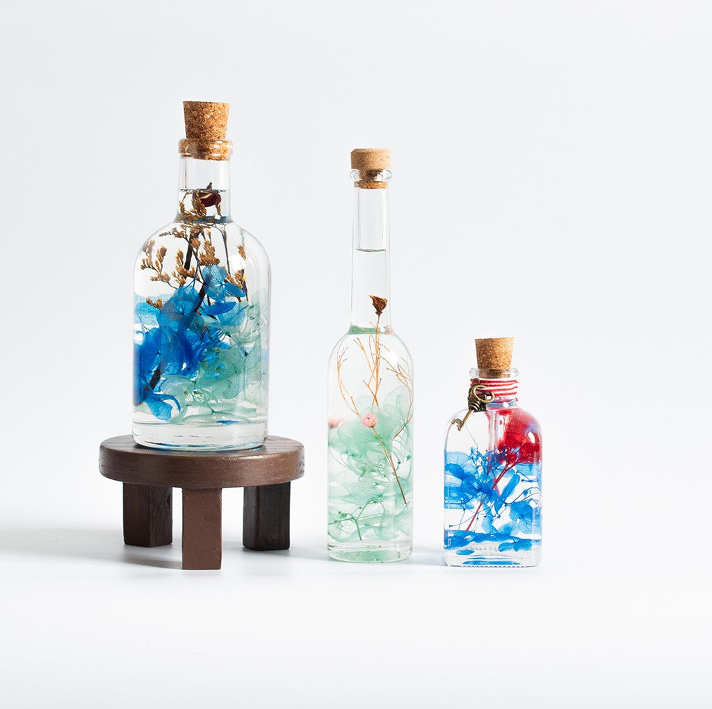 Set of The Bright Blues Tabletop Decor by myBageecha – includes A Big Splash, Blossoms of the Sky, Prismatic Hues with Dish of Bliss circular stand.