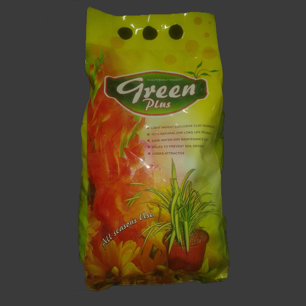 Green Plus balls layered in planter