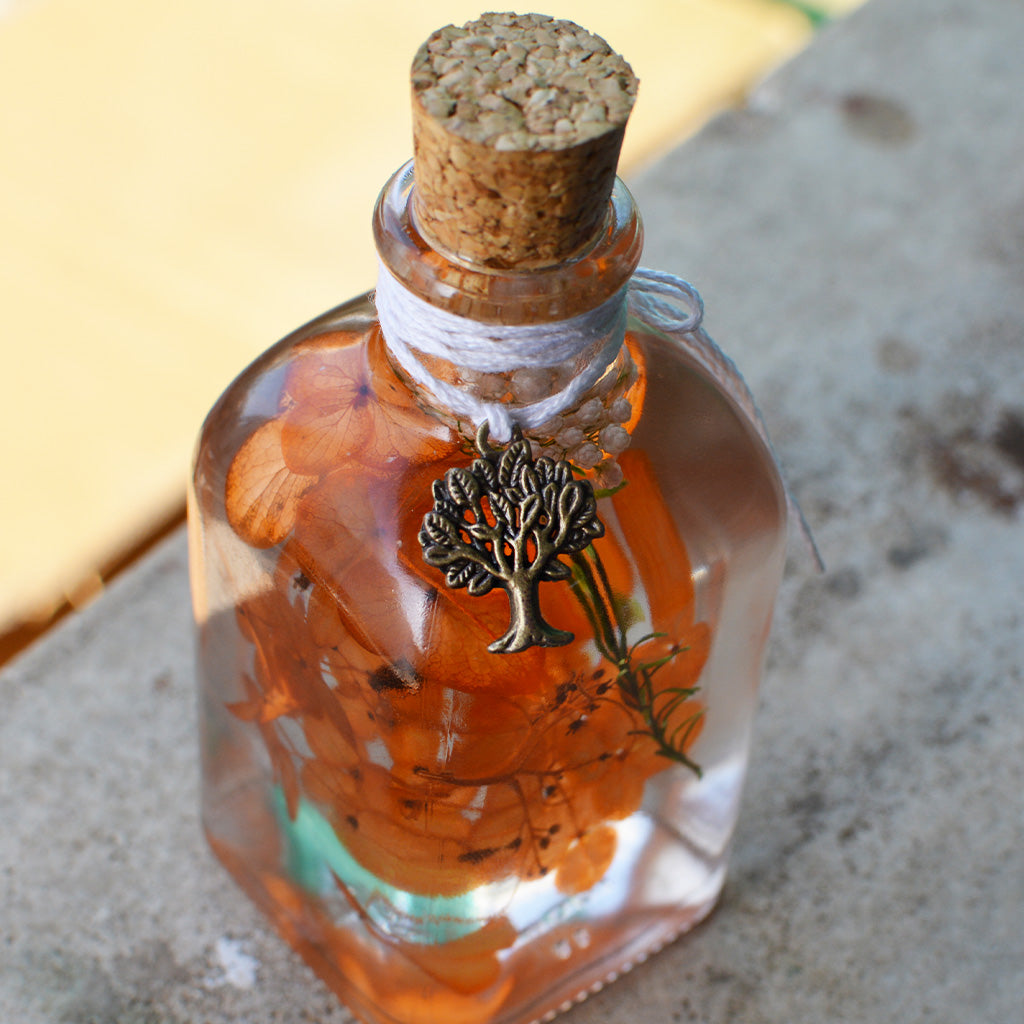 Tangerine Beaut Preserved Flower Tabletop on table – warm, bright décor statement.