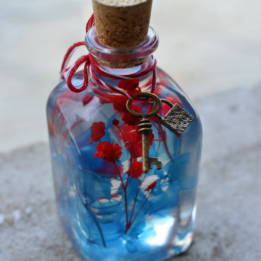 A playful, rainbow-like preserved flower composition that brightens any décor space.