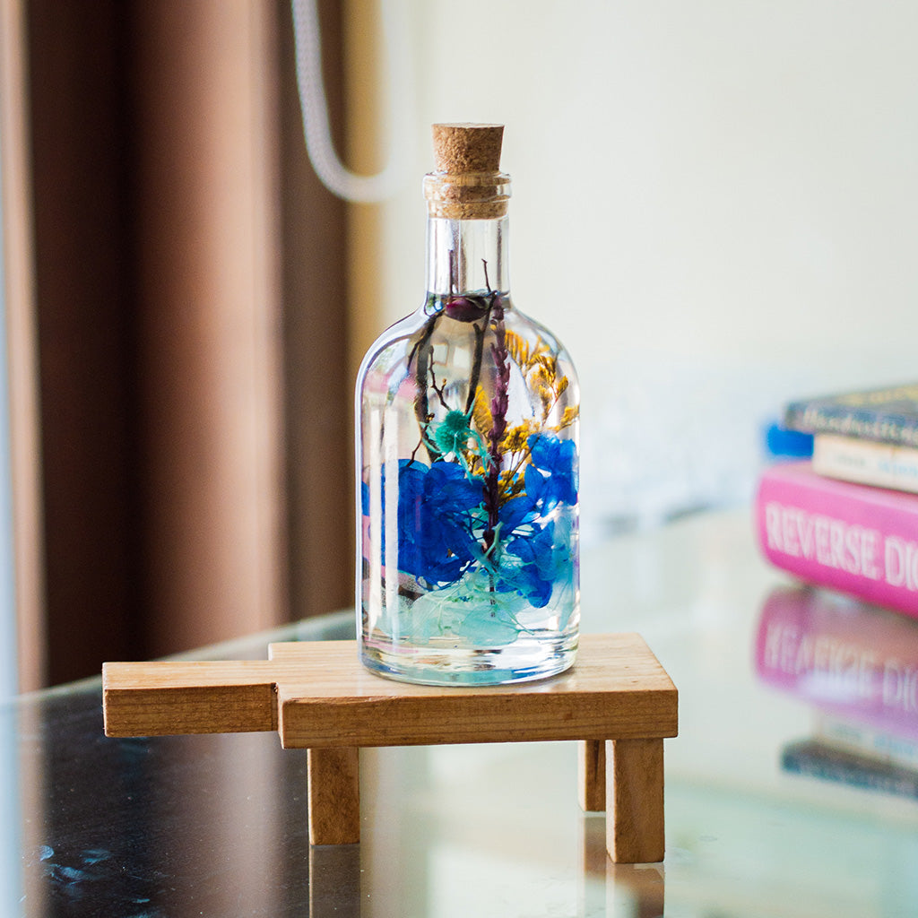 A Big Splash Preserved Flower Tabletop on rectangular stand – striking marine-inspired décor arrangement.