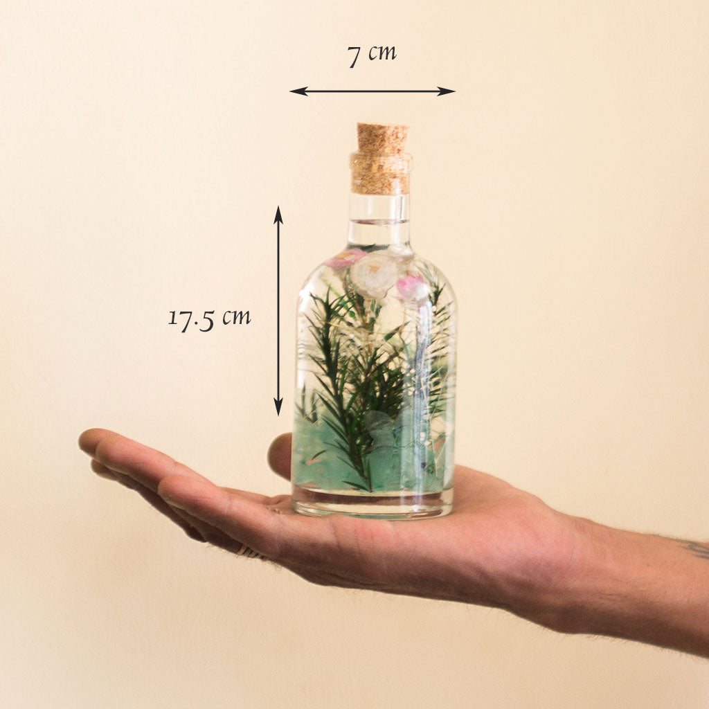 Aqua Spring Preserved Flower Tabletop shown in hand – refreshing and calming décor piece.