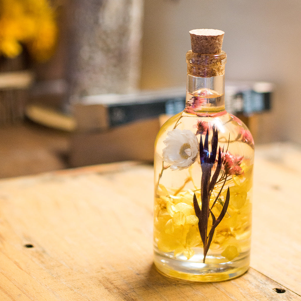 Close-up of Baroque Carafe Preserved Flower Tabletop by myBageecha – elegant tall carafe-style preserved arrangement.