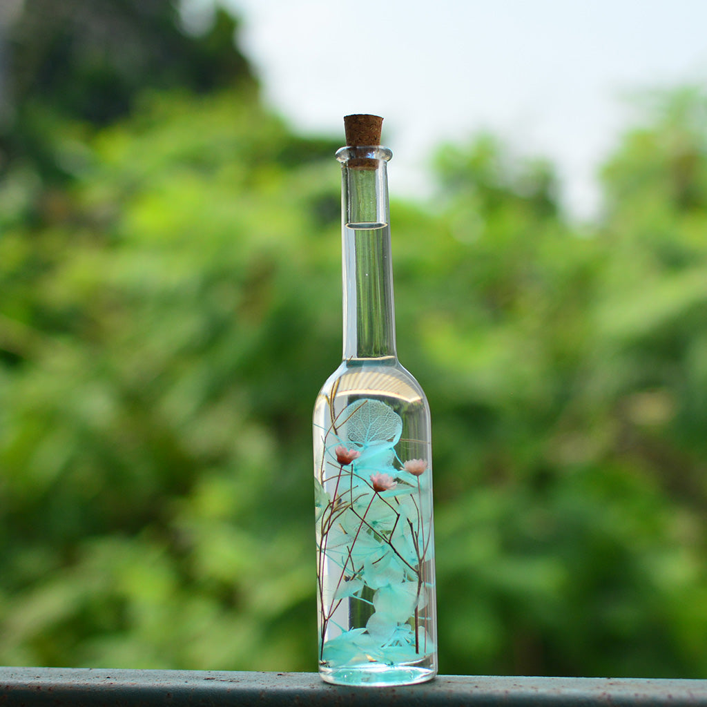 Blossoms of the Sky Preserved Flower Tabletop on table – fresh and airy preserved arrangement.