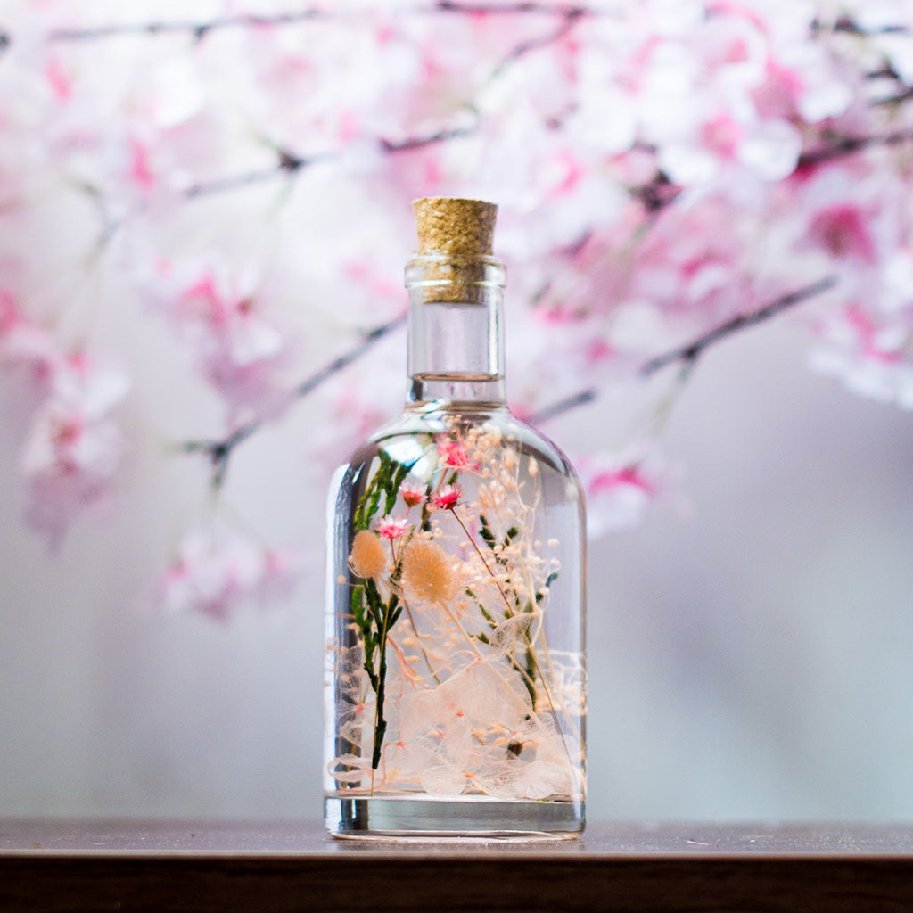 Blushing Ballet Preserved Flower Tabletop placed on table – feminine floral décor.