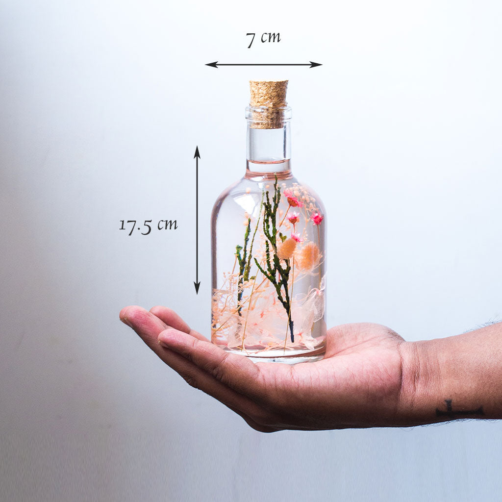 Blushing Ballet Preserved Flower Tabletop shown in hand – soft, graceful décor accent.