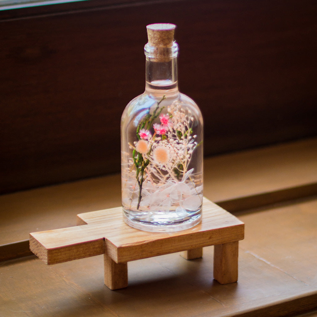 Blushing Ballet Preserved Flower Tabletop on rectangular stand – elegant pastel preserved display.