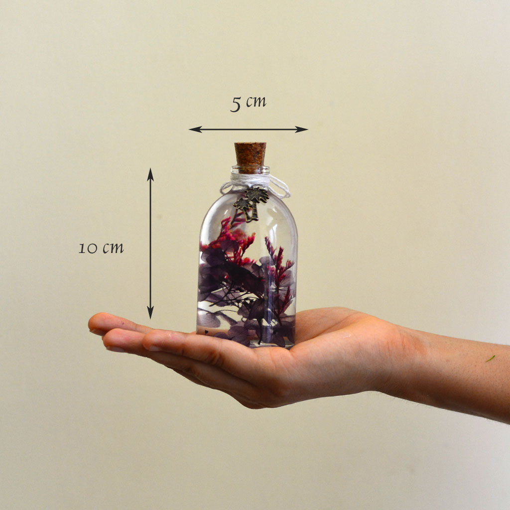 Blushing Mauve Preserved Flower Tabletop shown in hand – soft romantic décor piece.