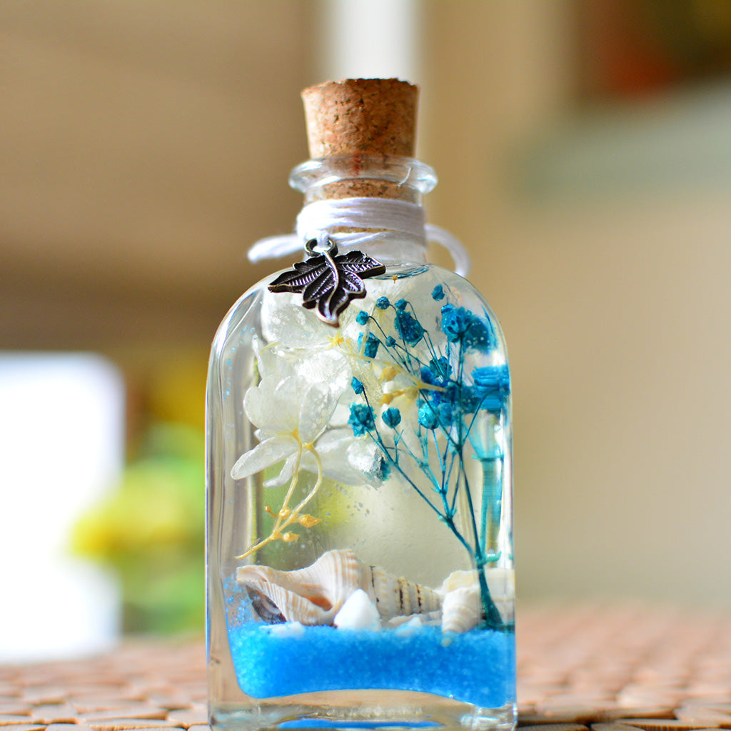 By The Bay Preserved Flower Tabletop on table – calm shoreline aesthetic.