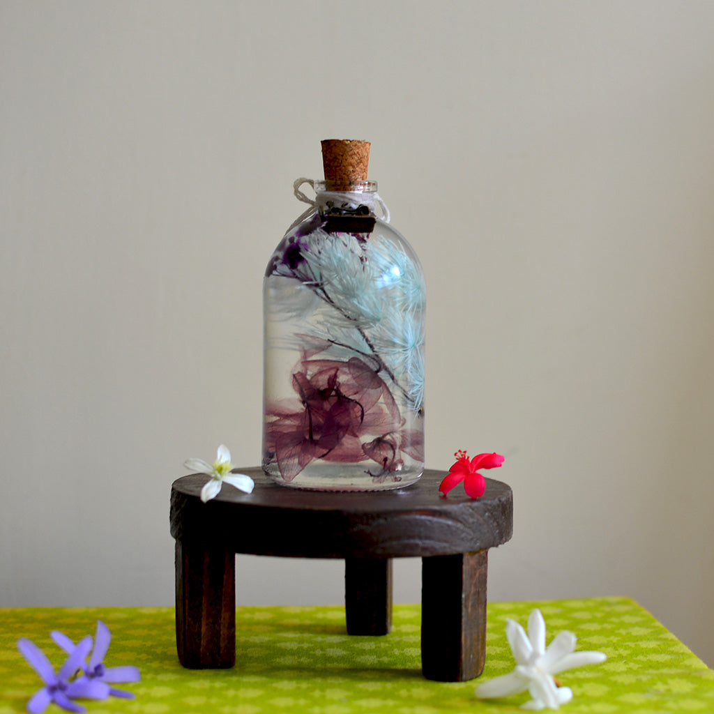 Celeste Bloom Preserved Flower Tabletop on circular stand – peaceful blue centerpiece.