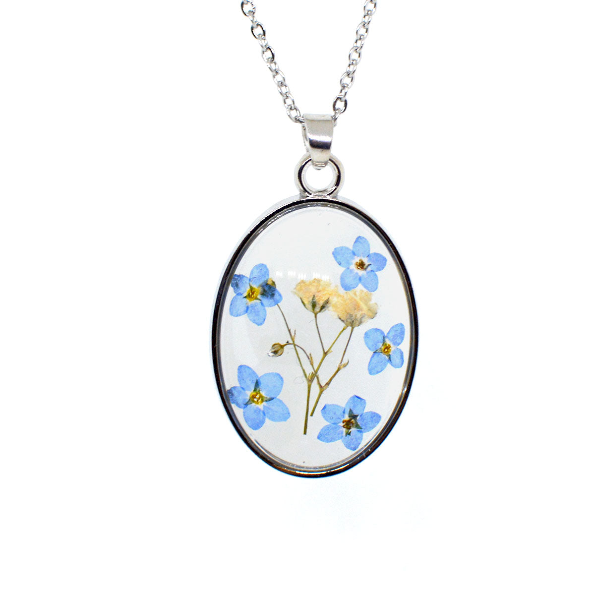 Artistic constellation-style pendant with preserved blooms encased in clear resin and metal frame