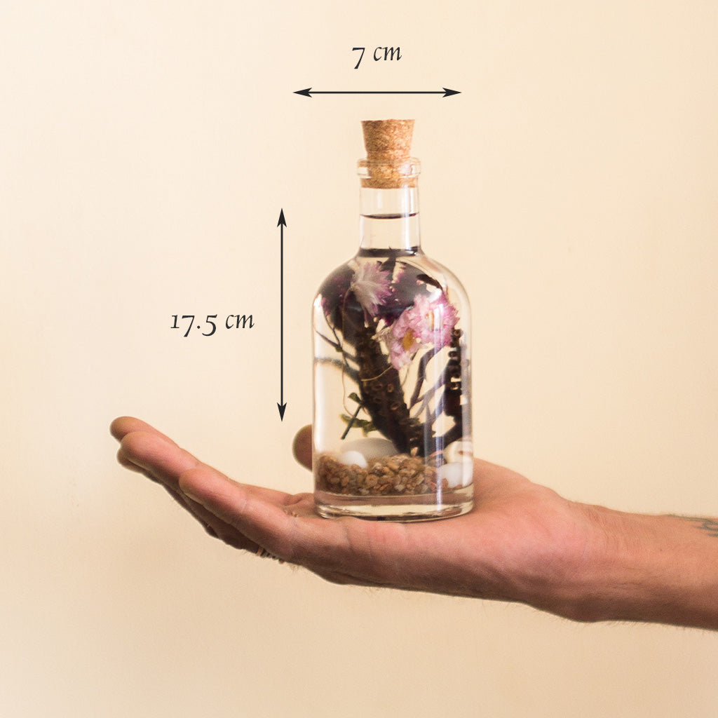 Curtained Wilderness Preserved Flower Tabletop shown in hand – compact woodland-inspired décor.