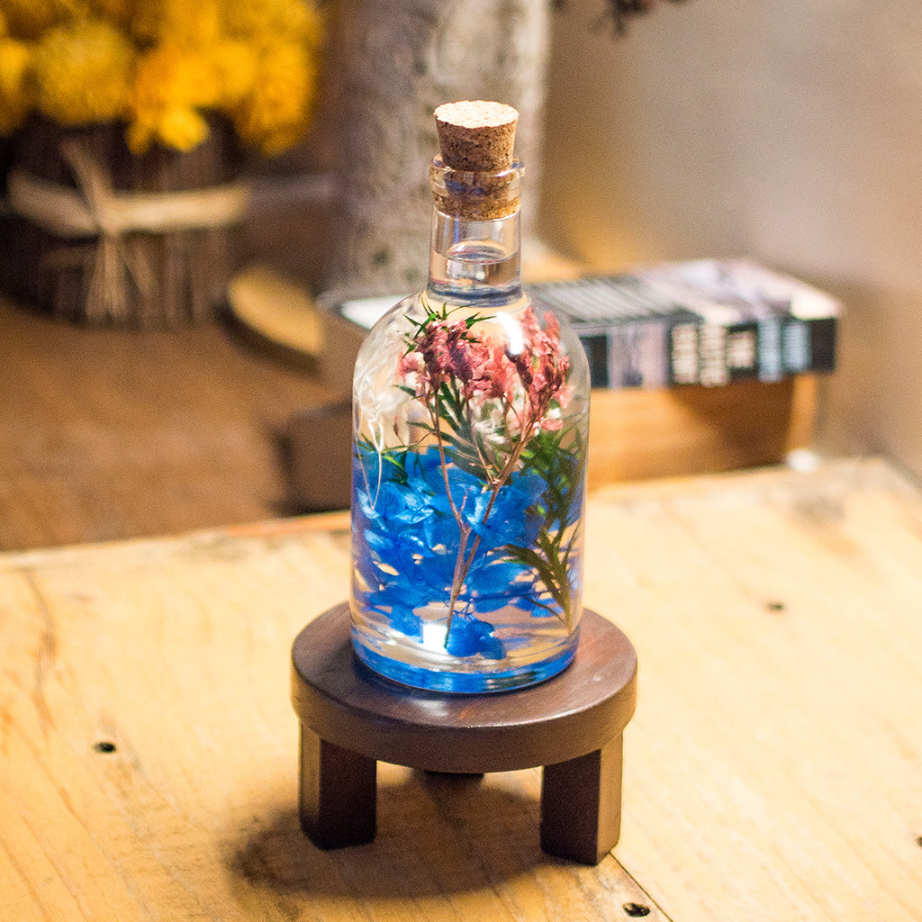 Enchanting Fresco Preserved Flower Tabletop on circular stand – art-inspired tabletop décor.