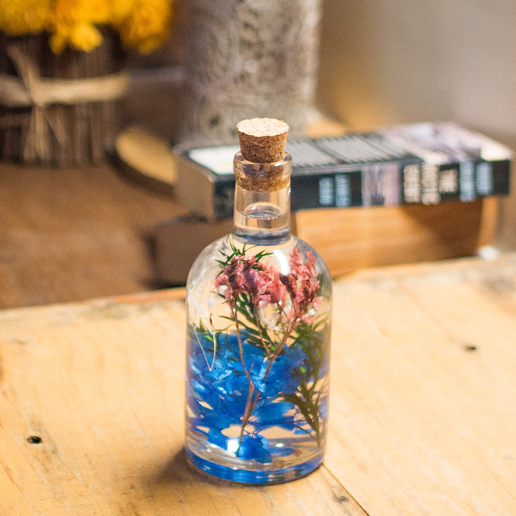 Enchanting Fresco Preserved Flower Tabletop placed on table – artistic décor accent.