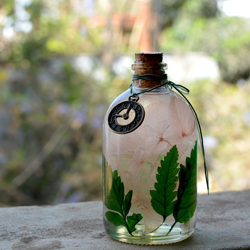 Close-up of Eternal Flora Preserved Flower Tabletop by myBageecha – preserved botanical blend in glass bottle.