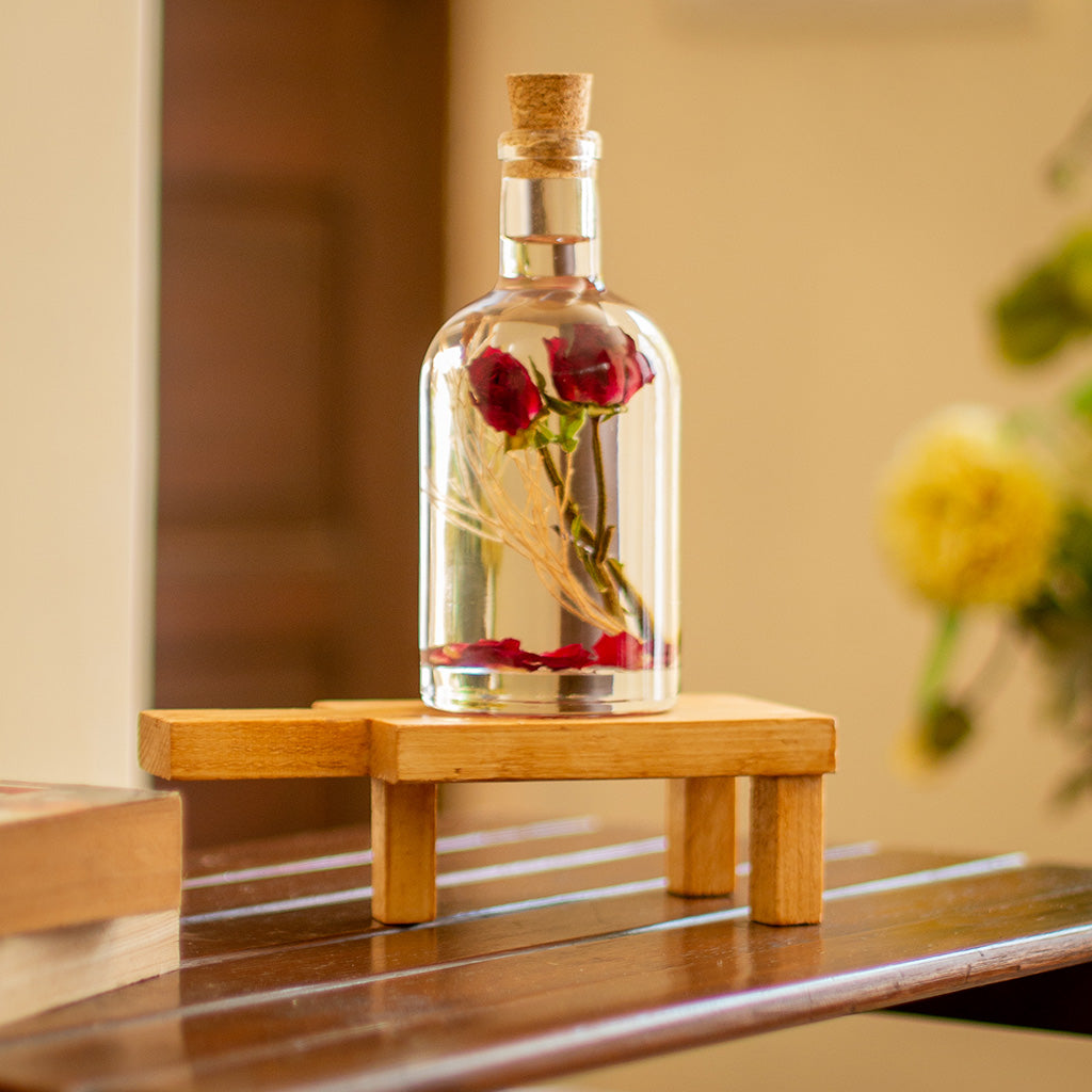 Floraison Quaint Rose Preserved Flower Tabletop on rectangular stand – graceful preserved floral arrangement.