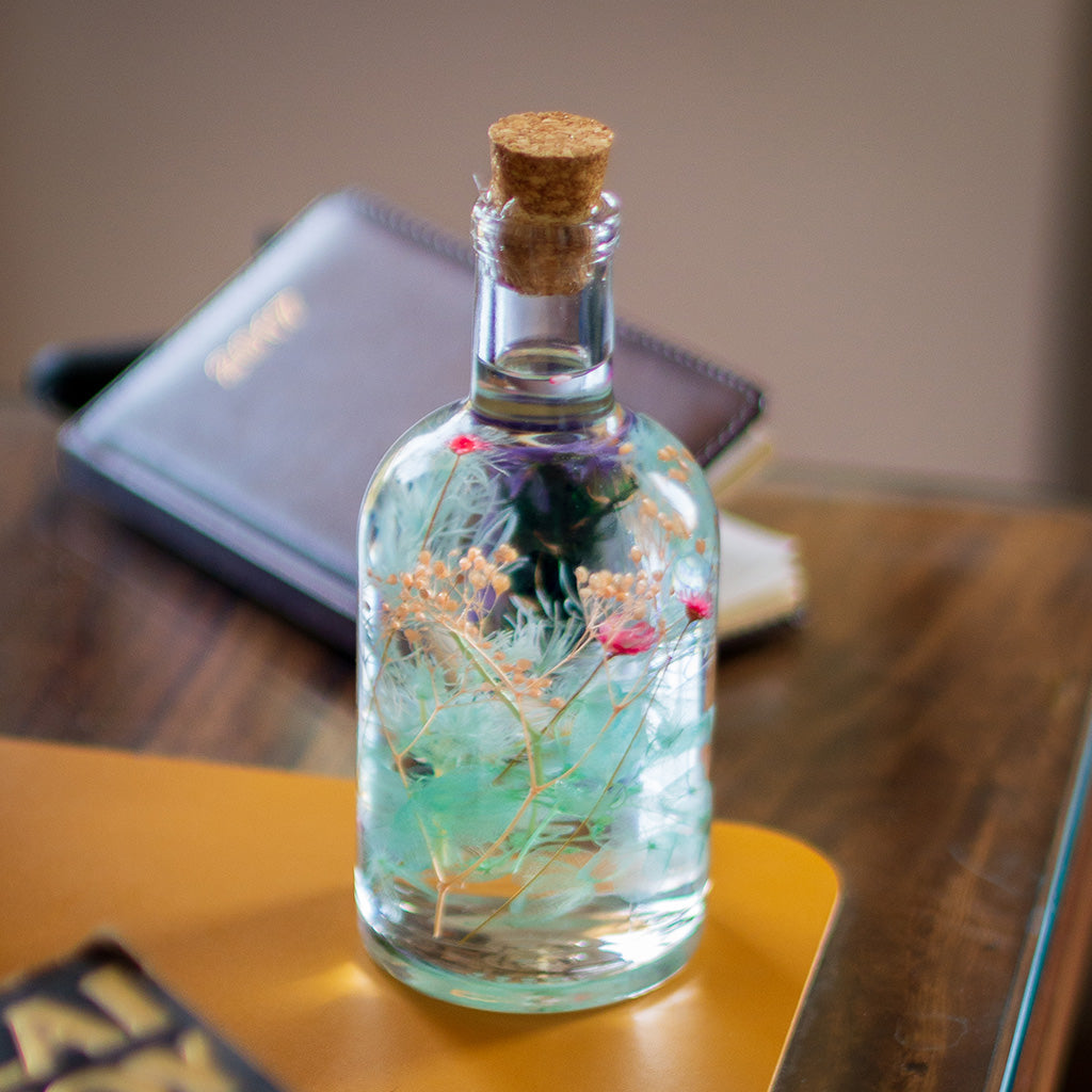 Frolicking Blues Preserved Flower Tabletop placed on table – lively preserved décor piece.