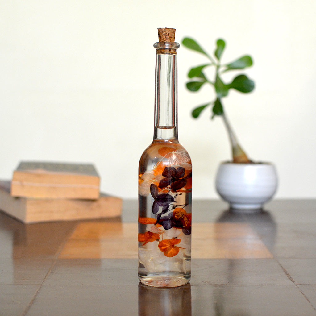 Honey Glimpses Preserved Flower Tabletop placed on table – gentle honey-toned floral piece.