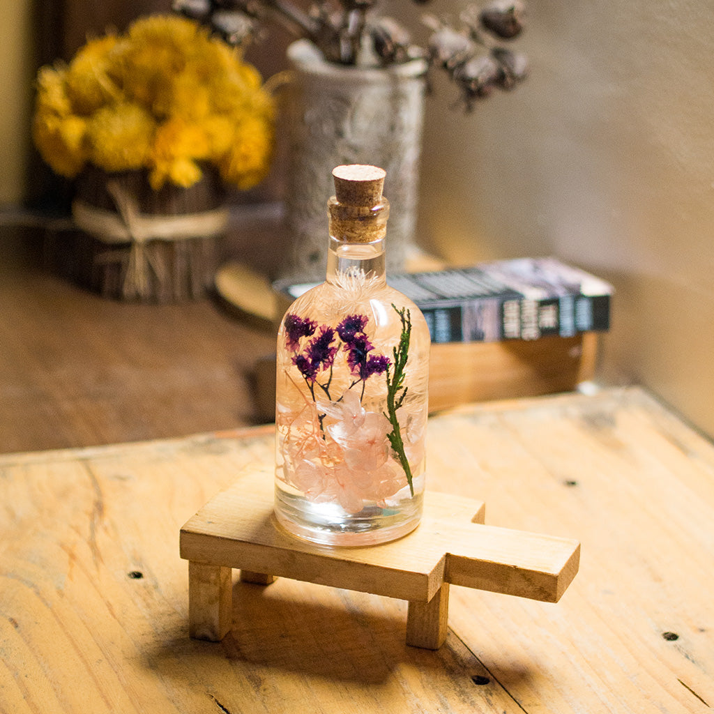 Peachy Peep Preserved Flower Tabletop on rectangular stand – pastel preserved display.