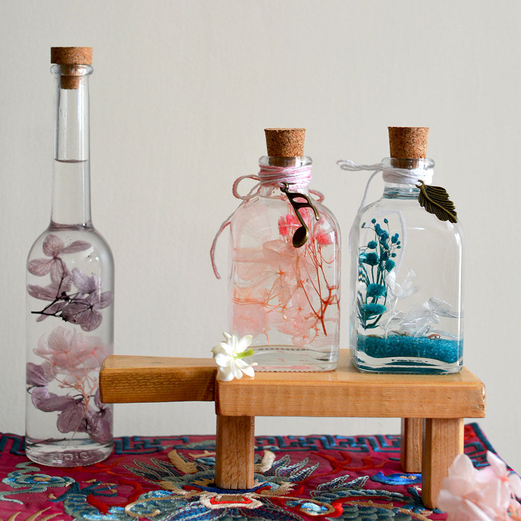 Platter of Delight Stand holding preserved décor – tabletop display styling.