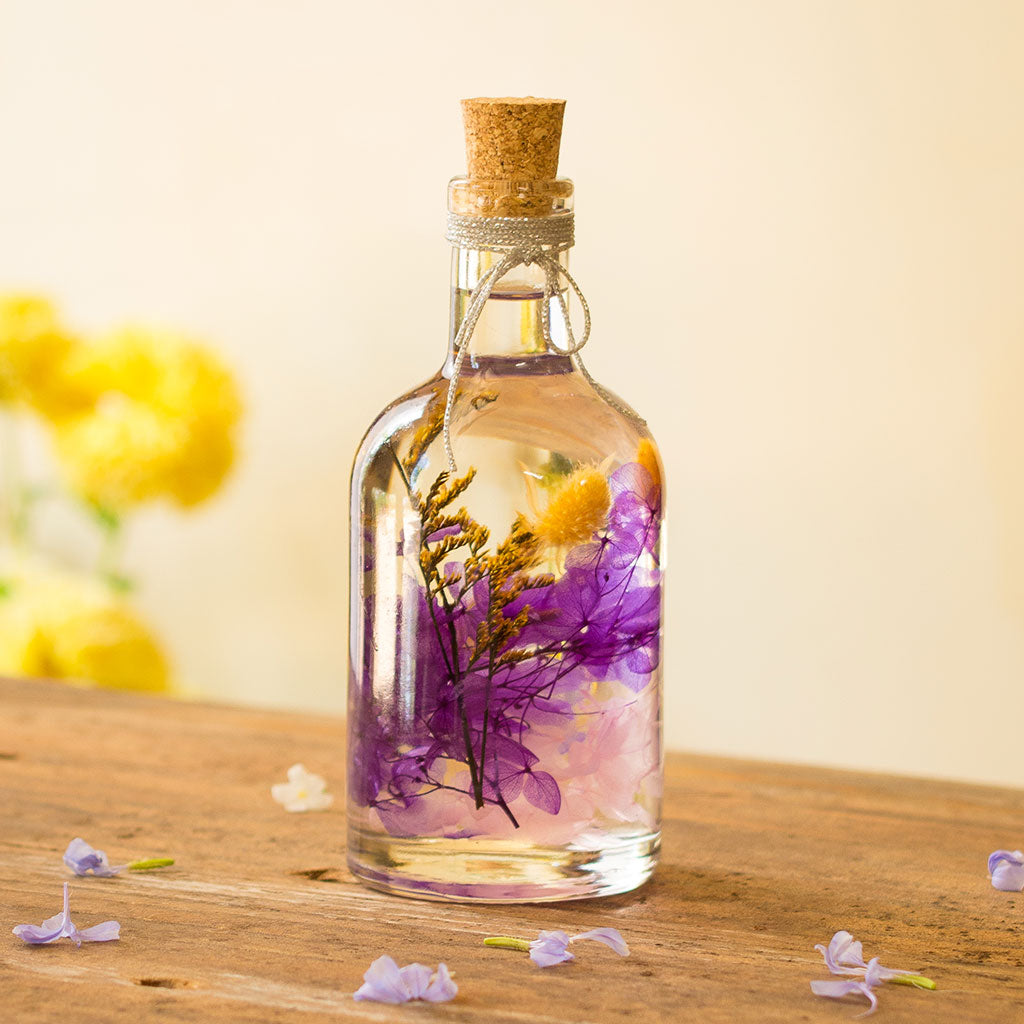 Close-up of Precious Purple Preserved Flower Tabletop by myBageecha – deep purple preserved blooms in dome bottle.